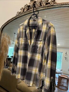 Eddie Bauer Yellow and navy Plaid Lightweight flannel with raw edge bottom.